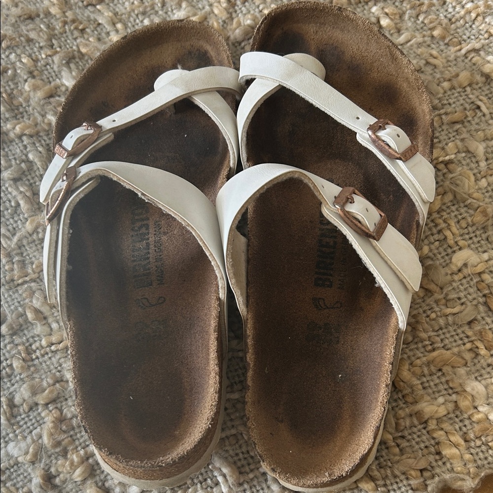 White Birkenstock Mayari Birke-flor sandals. EU 39. Lots of wear left in soles.